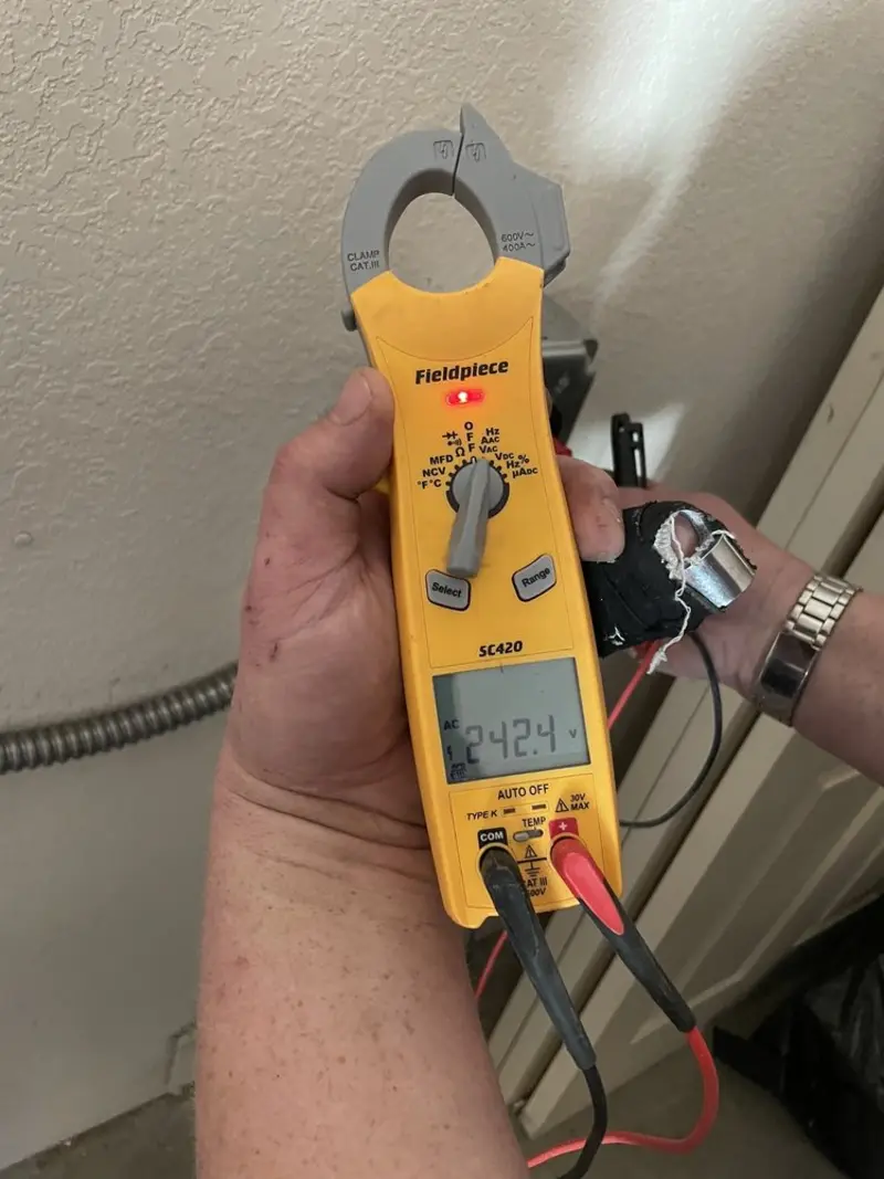 Voltage testing with clamp meter during Generator Installation in East Port Orchard